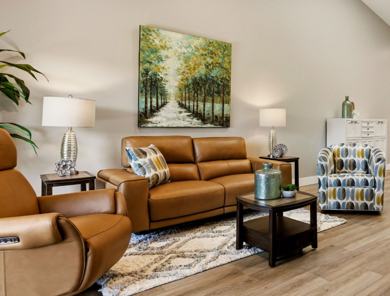 Living room with vaulted ceiling and hardwood floors